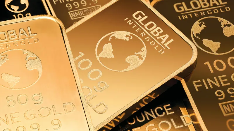 Золотые слитки, золотой слиток, золото, мерные слитки, мерный слиток, инвестиционное золото, стоимость золота, цена золота 