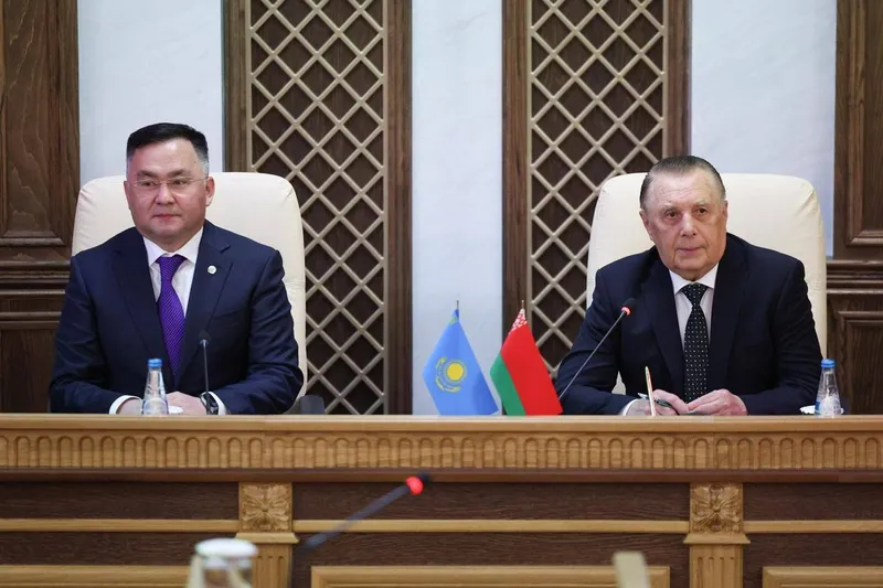 Асламбек Мергалиев и Валентин Сукало