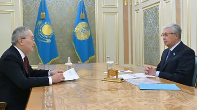 председатель АФМ Жанат Элиманов, президент Казахстана Касым-Жомарт Токаев