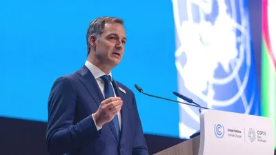 экс-премьер Бельгии