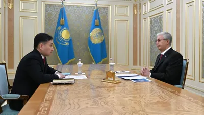 президент Казахстана Касым-Жомарт Токаев и министр труда и соцзащиты Аскарбек Ертаев