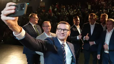 экс-премьер Польши